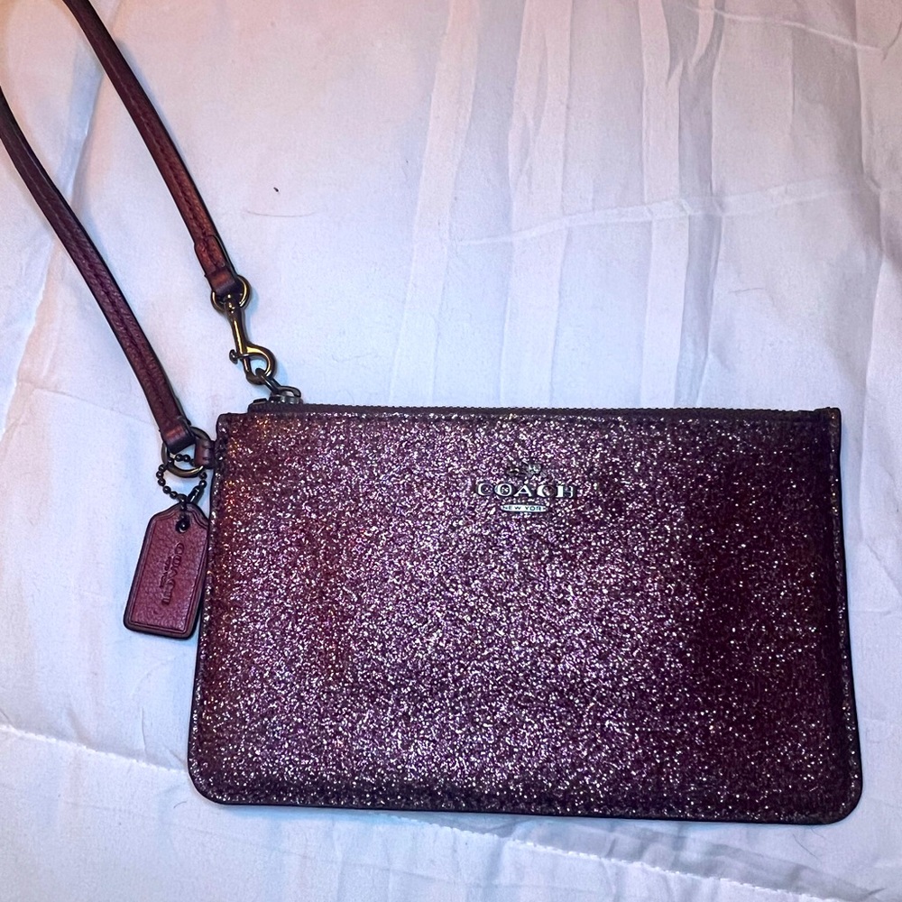 Coach berry sparkly glitter wristlet. F64585